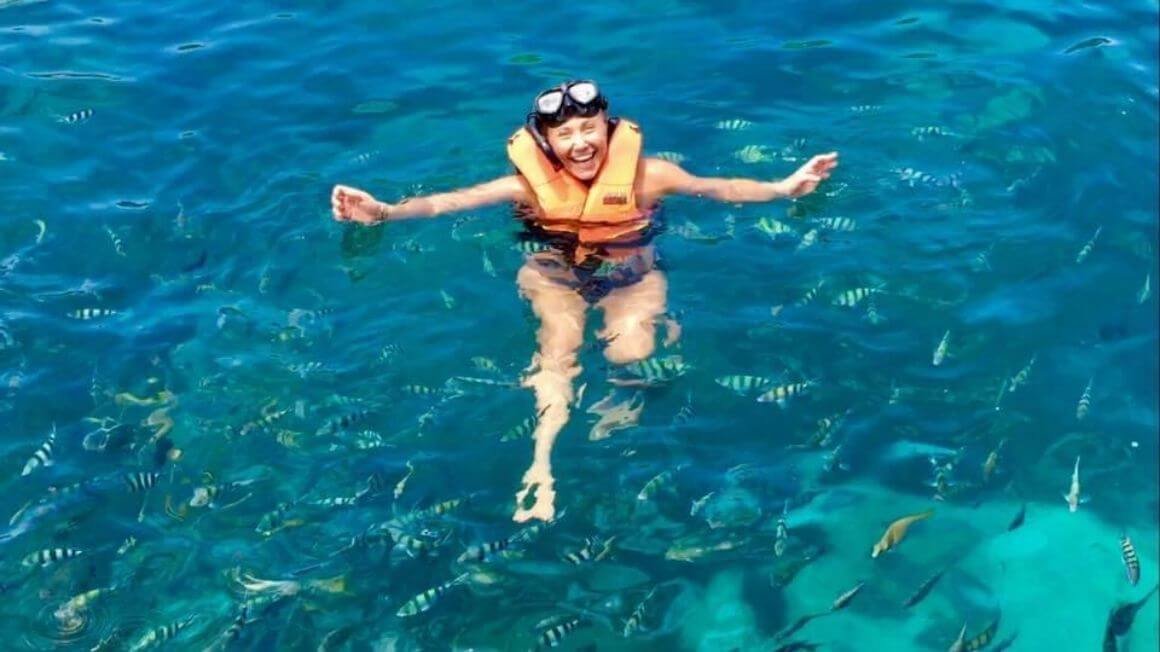 Diver exploring vibrant coral reef underwater